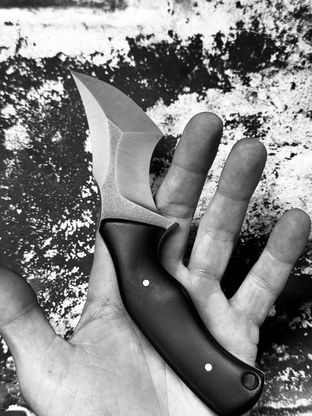 Crusader knife held in hand to show scale